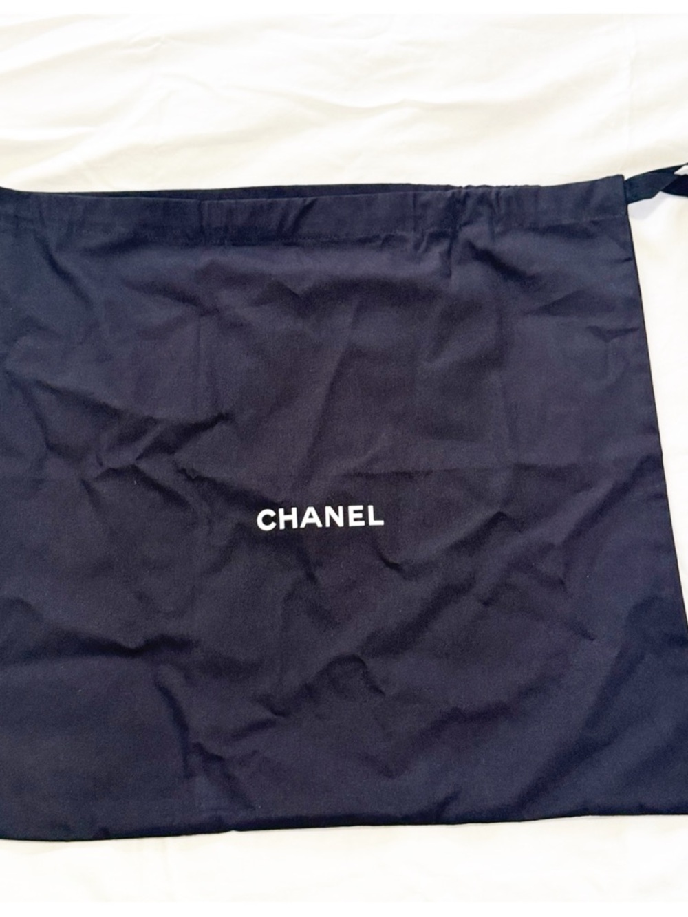 SOLD.    CHANEL Black Logo Dust Bag